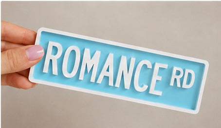 Romance Rd Bookshelf Street Sign